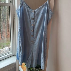 This is a cute beach cover up for the summer time. It has never been worn!